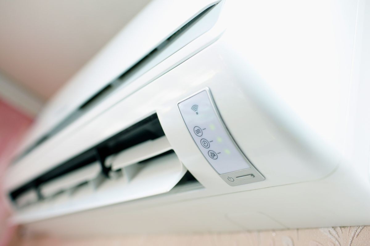Close-up of modern air conditioner indoor unit control panel, relevant for diagnosing when your ac making noise