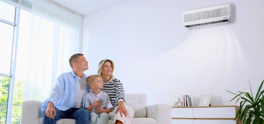 Family relaxing comfortably in a clean home with fresh air from proper maintenance, highlighting how often to change hvac filter.
