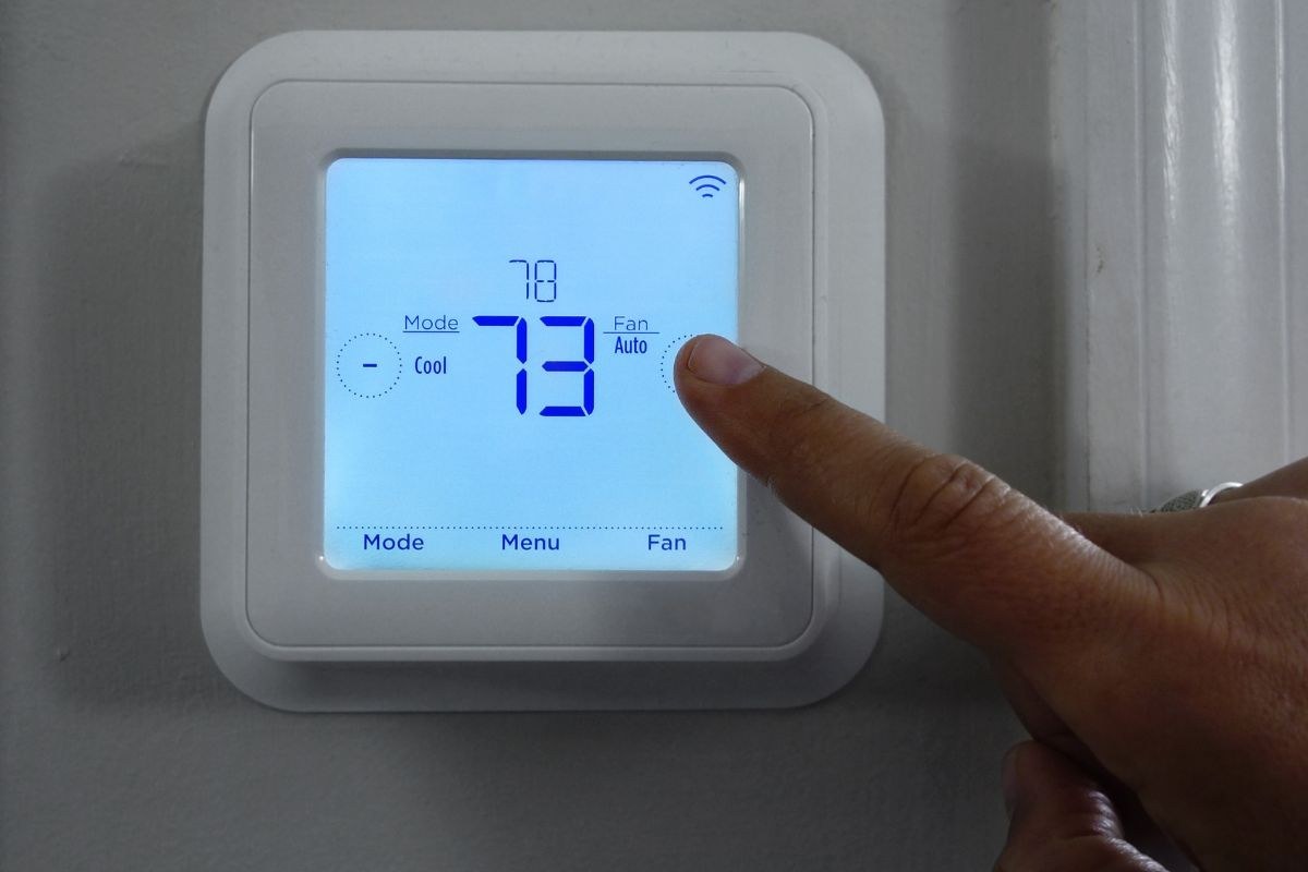 The person fixed the thermostat fan settings.
