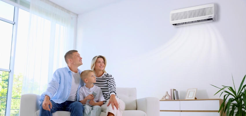 Family relaxing comfortably in a clean home with fresh air from proper maintenance, highlighting how often to change hvac filter.